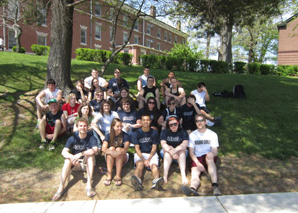 students pose in front of Frost Hall