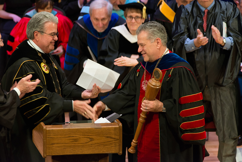 Chancellor Caret congratulates Dr. Nowaczyk