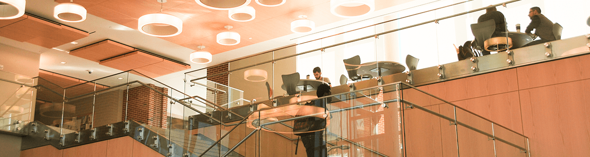 Students studying on the Gira Center mezzanine