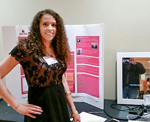 female student presenting research results