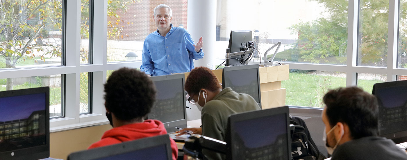 A Frostburg professor teaches in a computer lab in the Compton Science Center