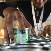 Grabbing a can at PAWS Pantry